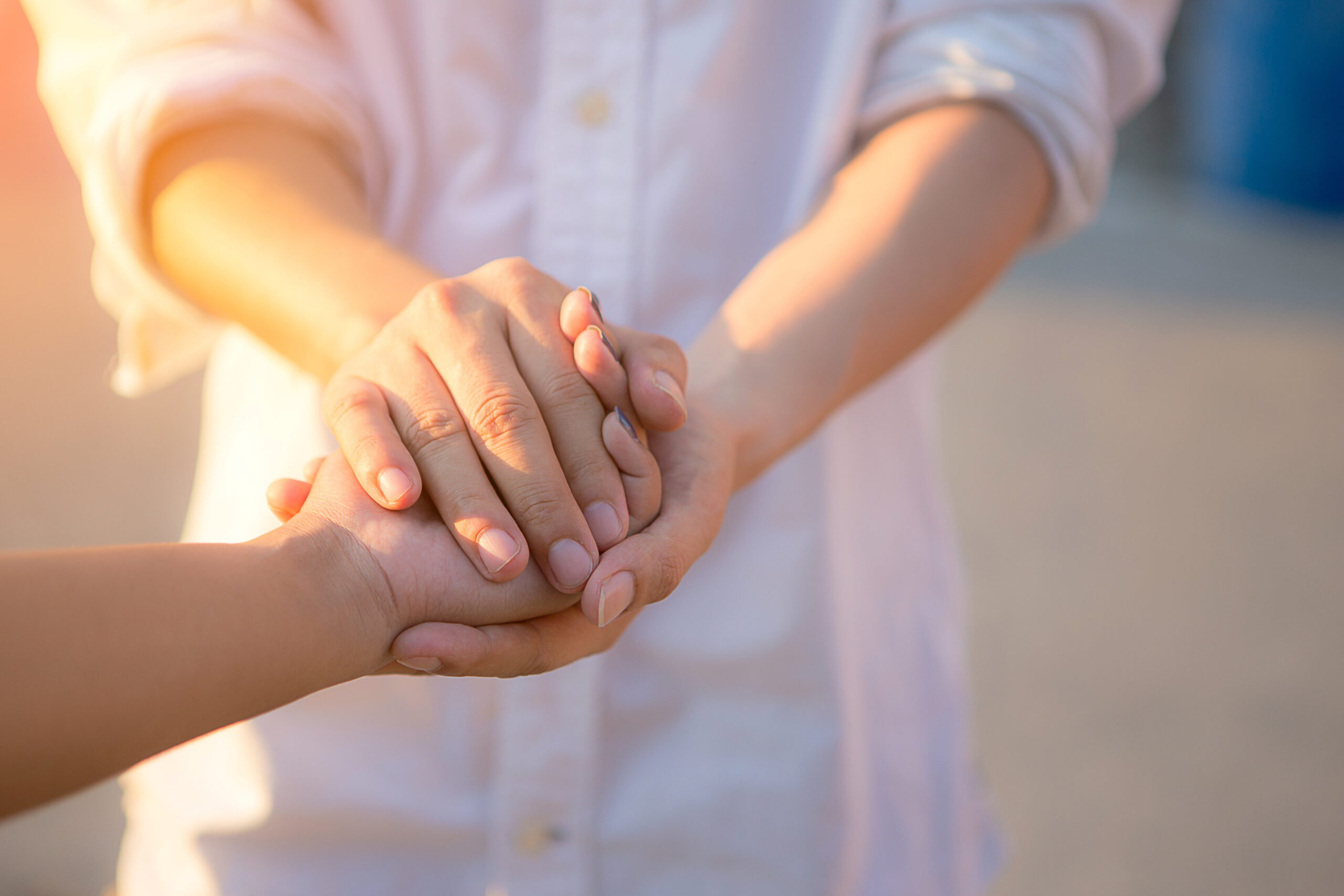 Man and woman holding hands. Man and woman holding hands.